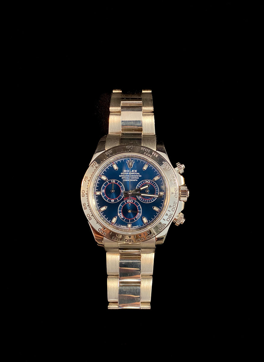 Gold daytona 2024 blue dial